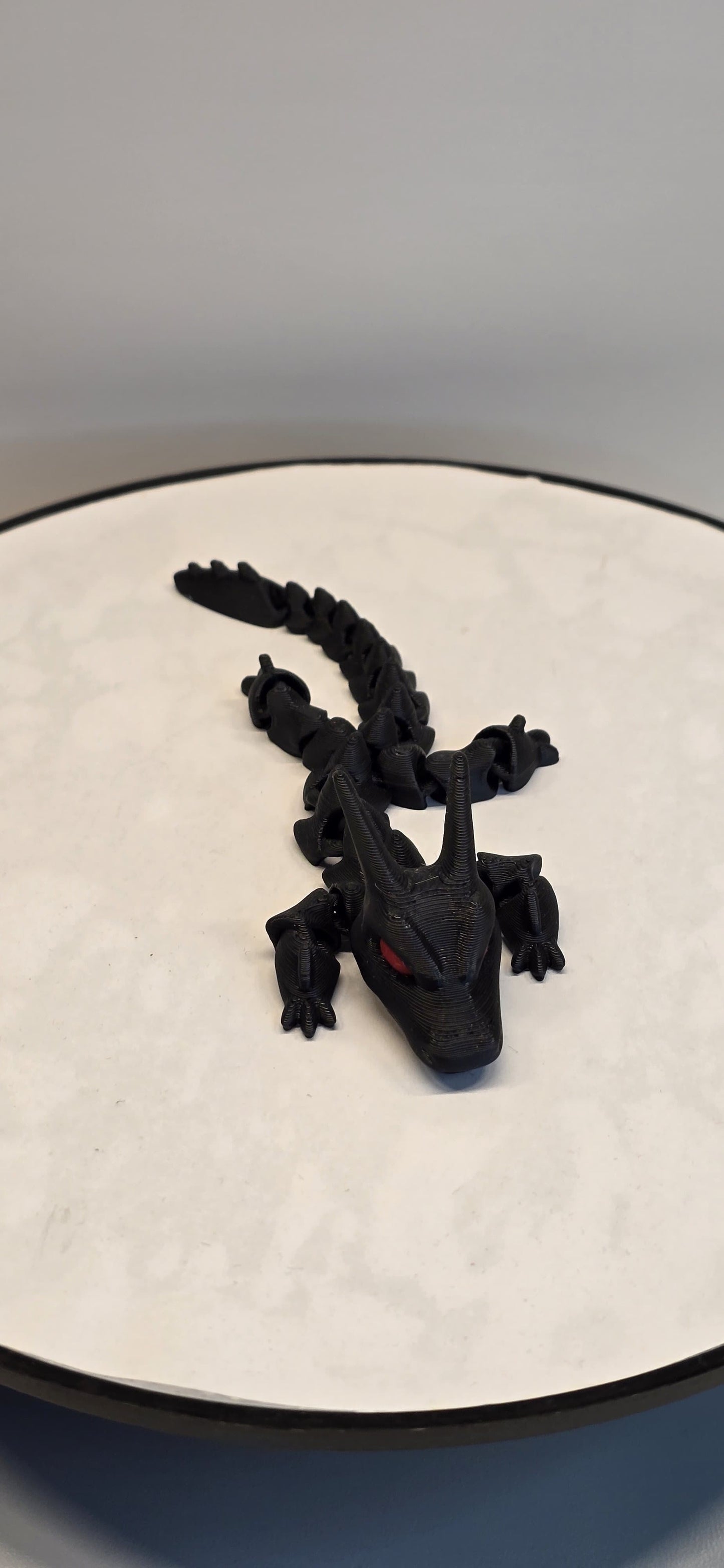 ShadowBlaze – The Black Dragon with Fiery Red Eyes
