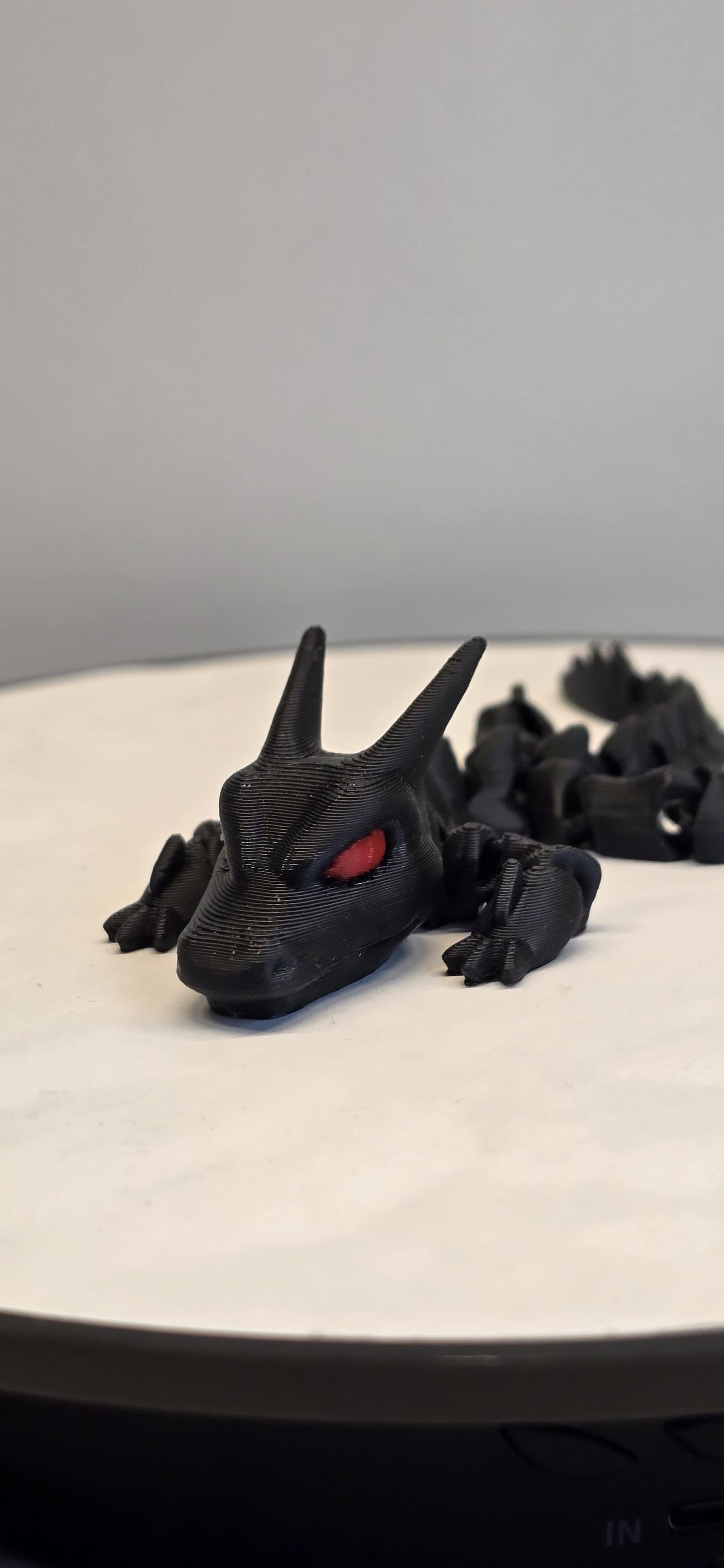 ShadowBlaze – The Black Dragon with Fiery Red Eyes