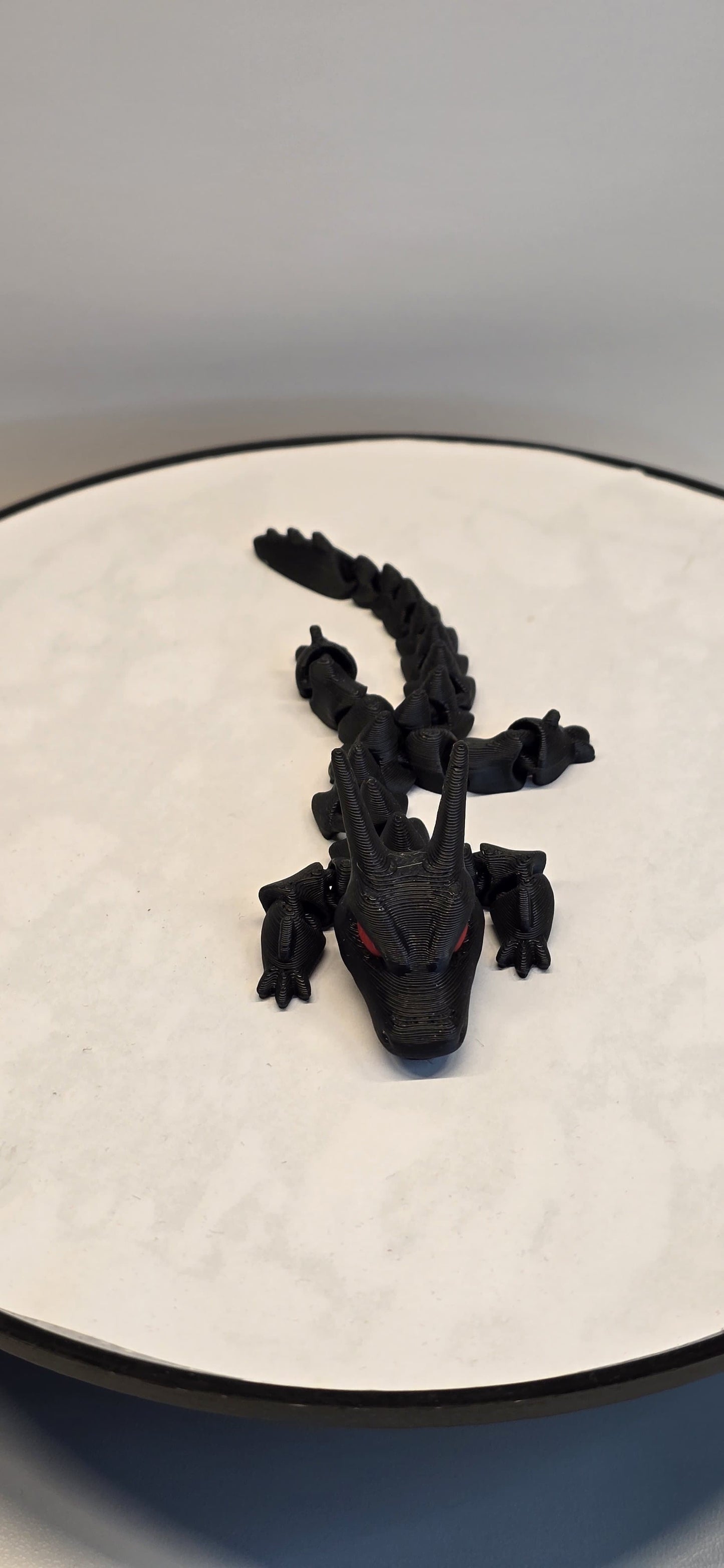 ShadowBlaze – The Black Dragon with Fiery Red Eyes