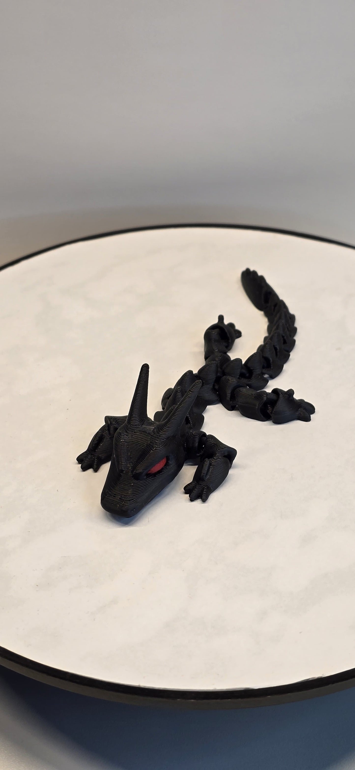 ShadowBlaze – The Black Dragon with Fiery Red Eyes