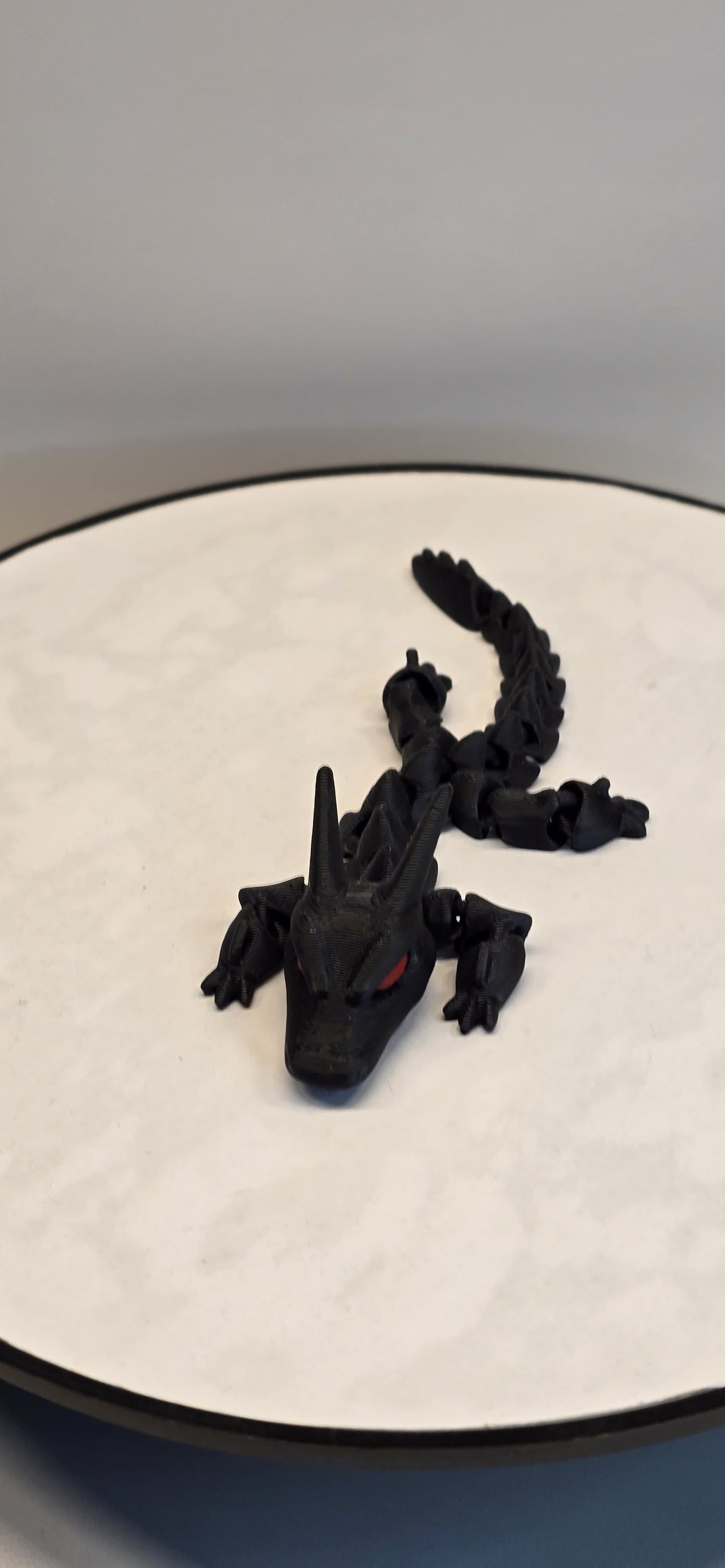 ShadowBlaze – The Black Dragon with Fiery Red Eyes