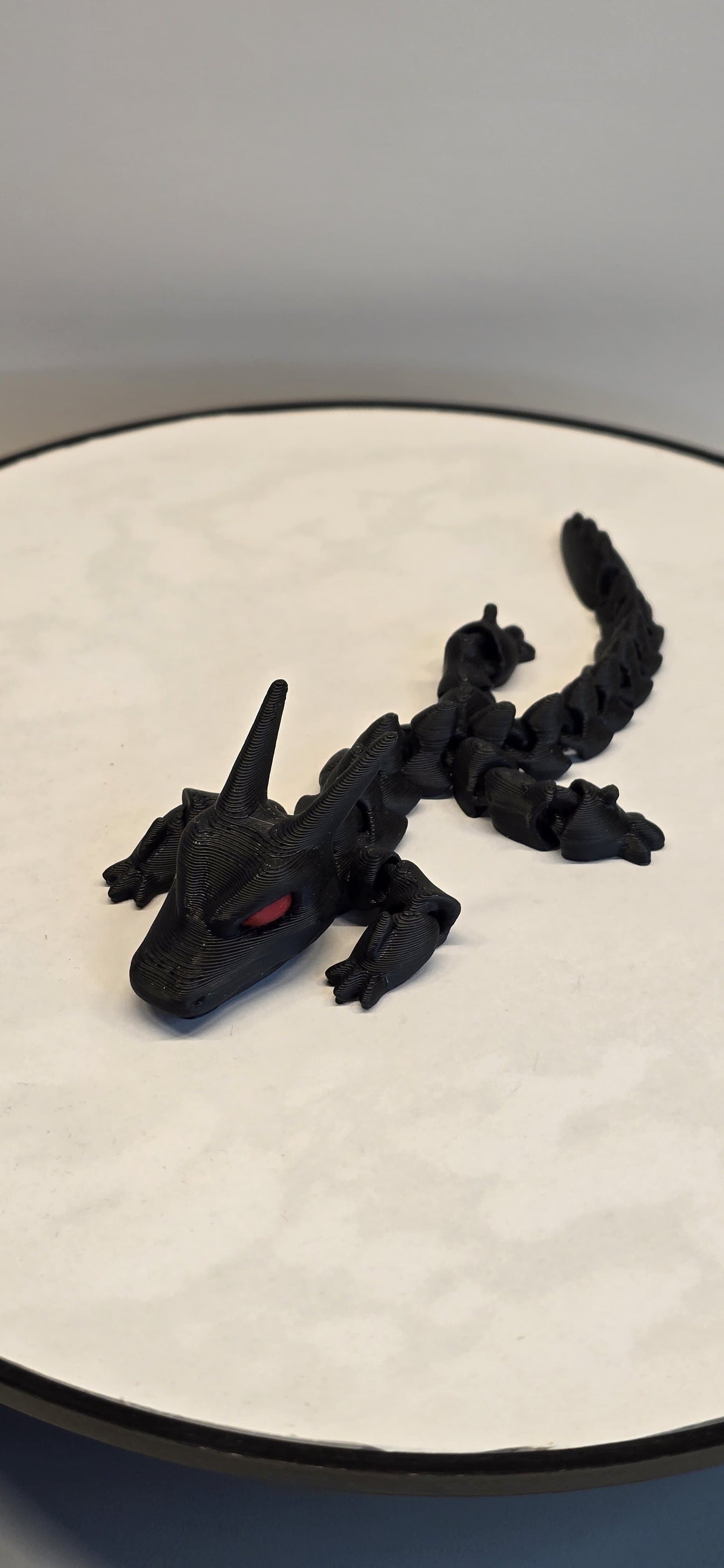 ShadowBlaze – The Black Dragon with Fiery Red Eyes